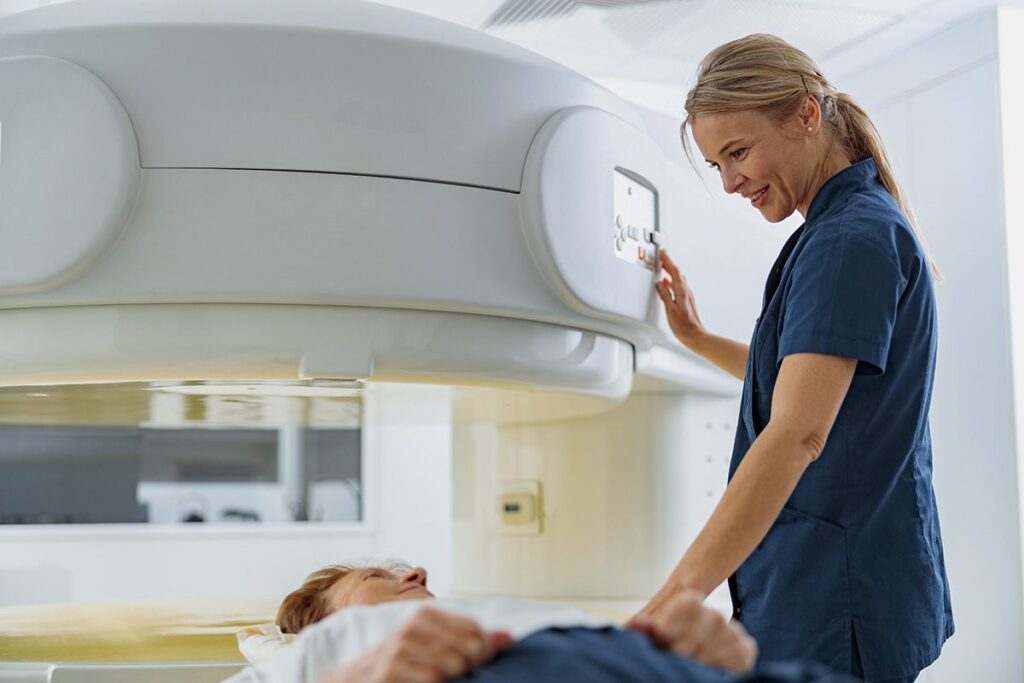 radiologist with patient undergoing prcedure